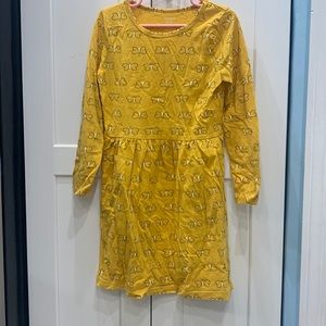 Never worn. Yellow long sleeved dress